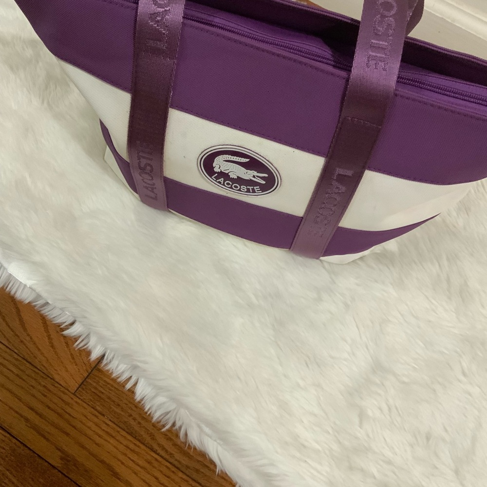Lacoste purple and white zippered tote Approximate Size H11 X W17